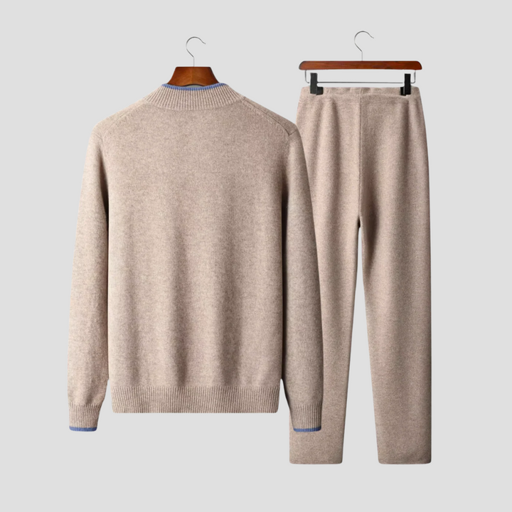 Stylish men's two-piece athleisure set, featuring a zip-up sweater & relaxed fit drawstring pants.