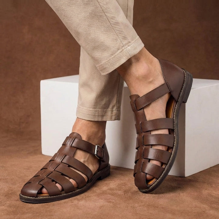 Durable men's closed-toe fisherman sandals, featuring an adjustable buckle strap for a secure & comfortable walking experience.