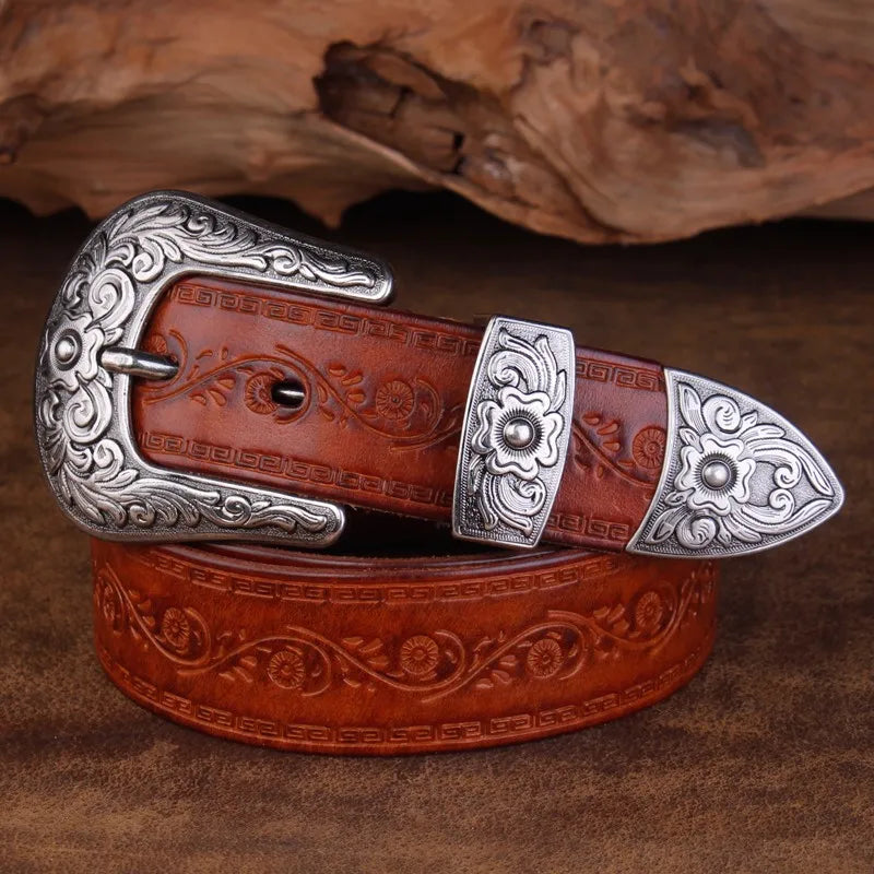 Distinctive metal buckle on a men's engraved western belt, adding a vintage touch to any cowboy outfit.