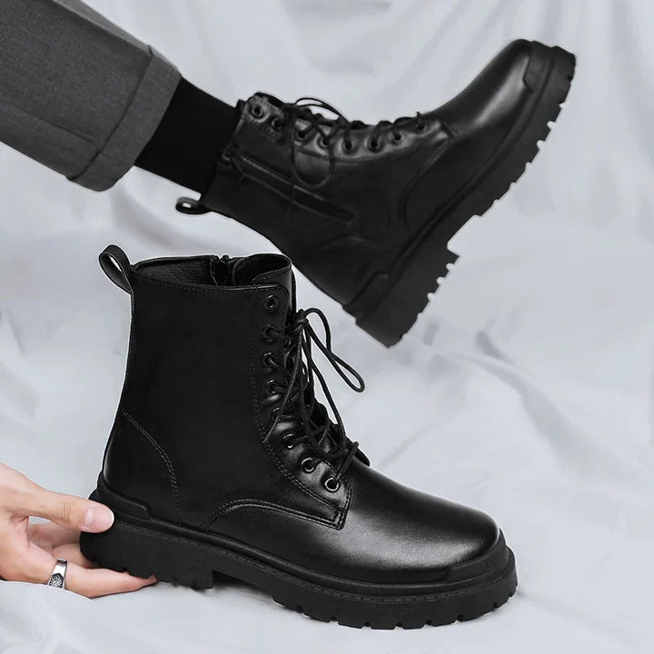 Rugged men's combat boots, black, featuring durable construction, traction sole, and side zipper for easy wear.