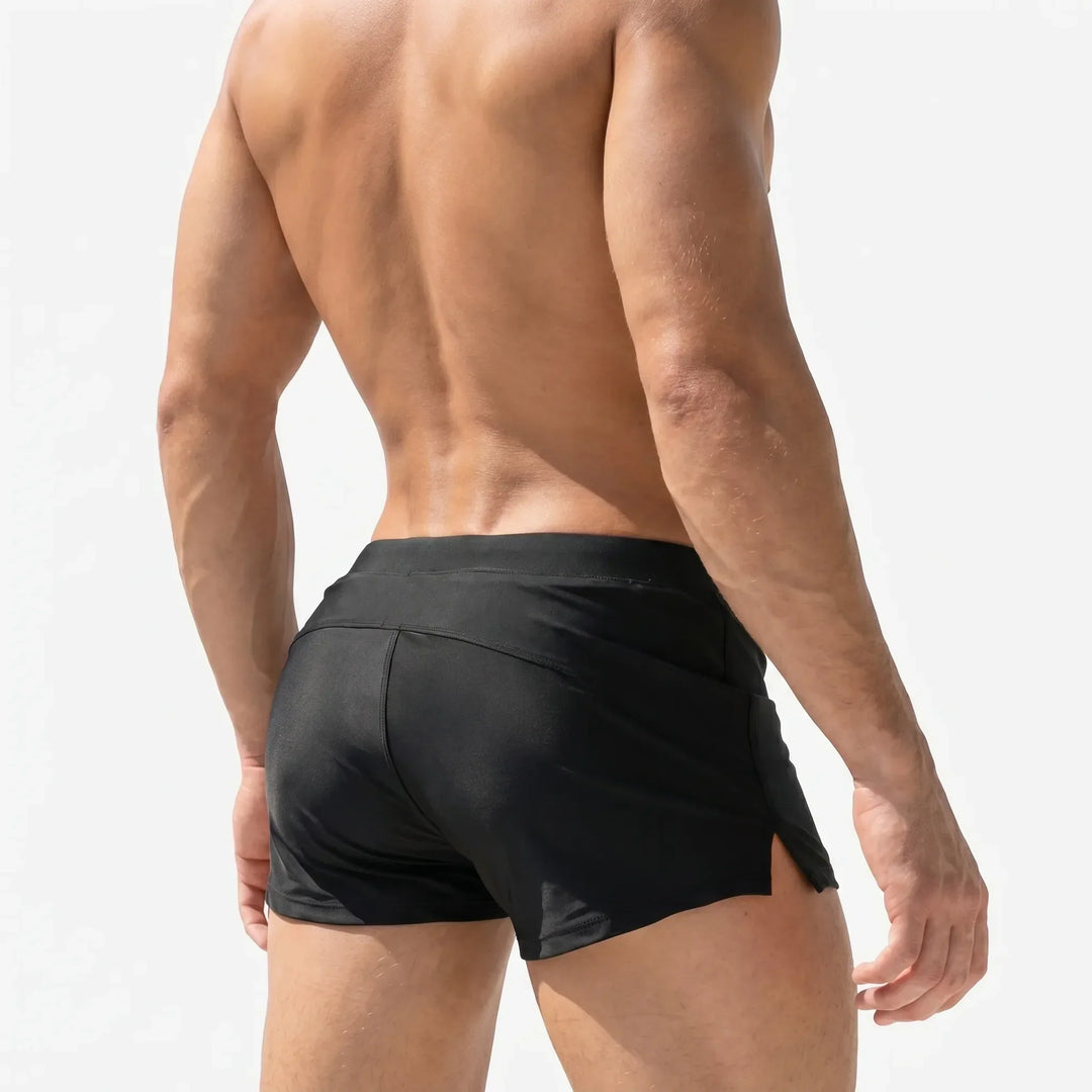 Comfortable men's athletic swimwear shorts, ideal for swimming, surfing, and water sports.