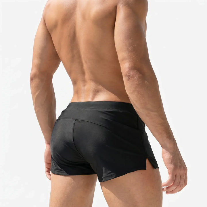 Comfortable men's athletic swimwear shorts, ideal for swimming, surfing, and water sports.