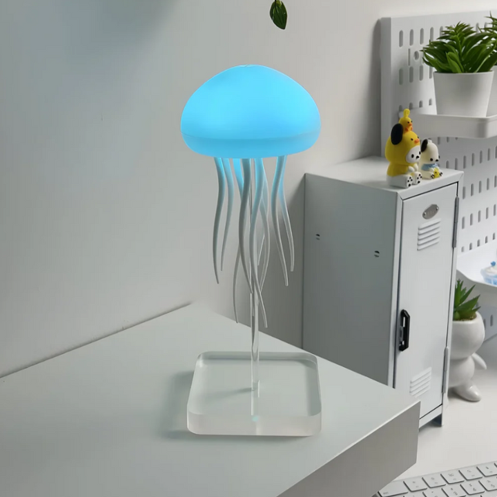 Sensory jellyfish lamp creates ambient lighting. A unique, portable LED mood light gift for any room.