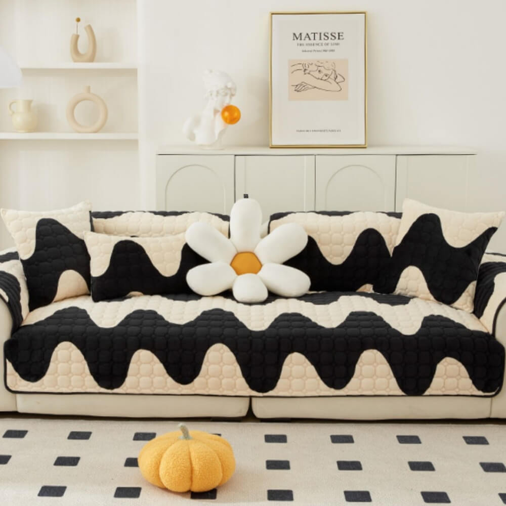 Pet-friendly milk velvet couch cover in a luxurious brown, featuring non-slip backing for sectional sofa.