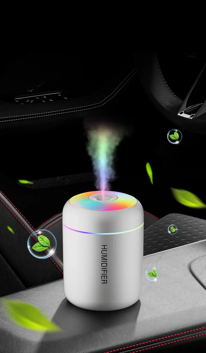 Sleek mini USB humidifier and aroma diffuser. Great for home, office, or travel.