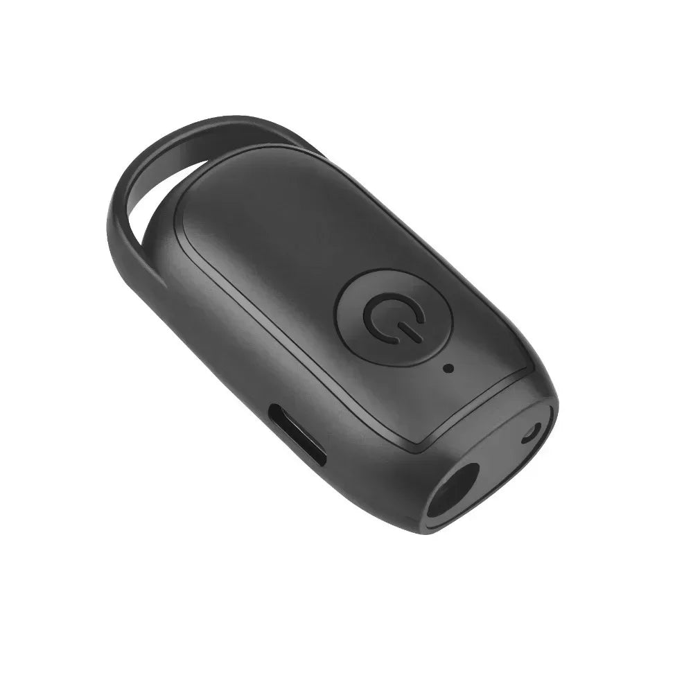 Mini ultrasonic dog anti-bark trainer, handheld pet training aid for humane bark control, rechargeable device.
