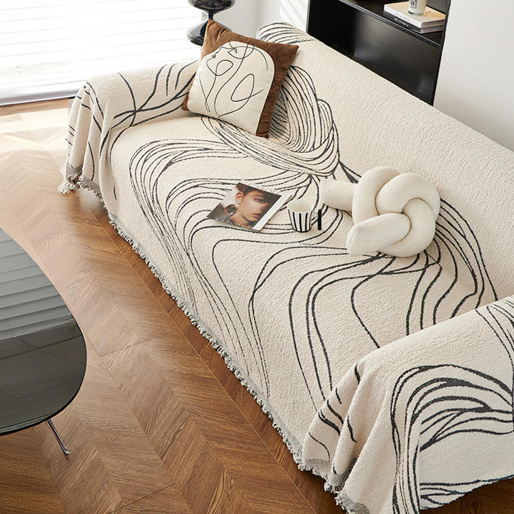 Minimalist chenille reversible pet-friendly couch cover in a living room setting, protecting sofa