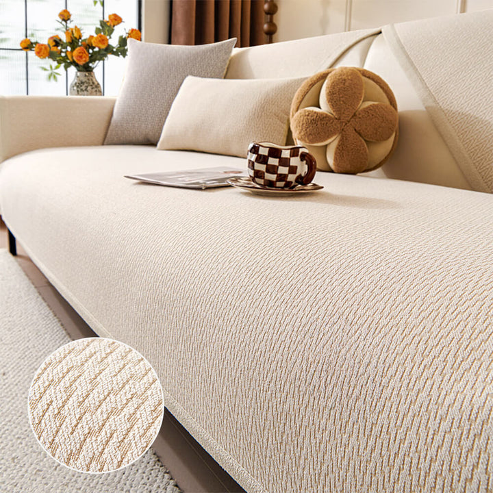 Minimalist chenille sofa cover in beige, pet-friendly and anti-slip, protecting furniture