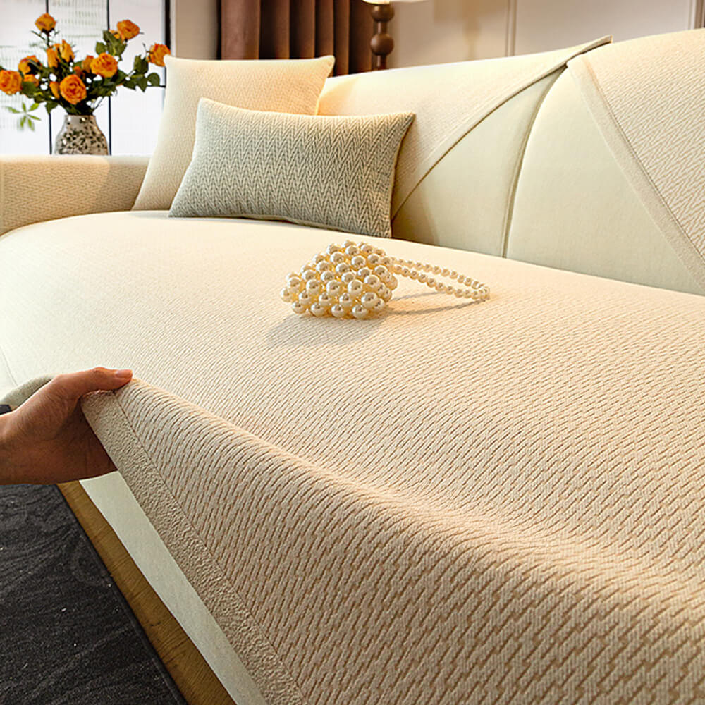 Folded chenille sofa cover showing plush texture, pet-friendly and easy-care home decor