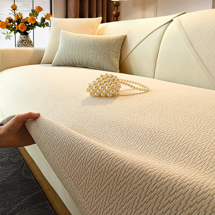 Folded chenille sofa cover showing plush texture, pet-friendly and easy-care home decor