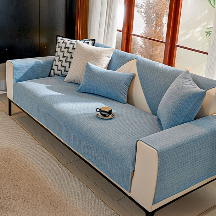 Water-resistant chenille sofa protector, wheat stripe pattern, a practical and chic home accessory.