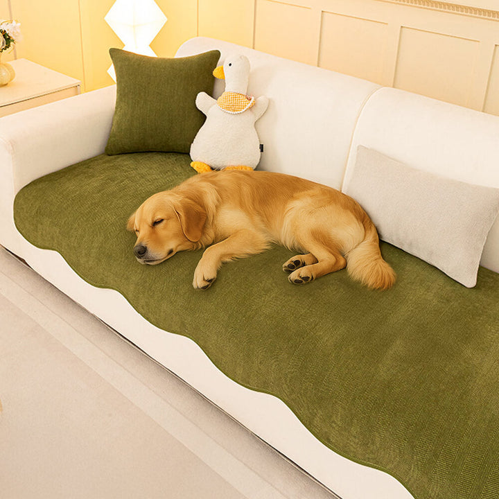 Pet-friendly chenille sofa protector with herringbone pattern and wavy edge, machine washable home decor.
