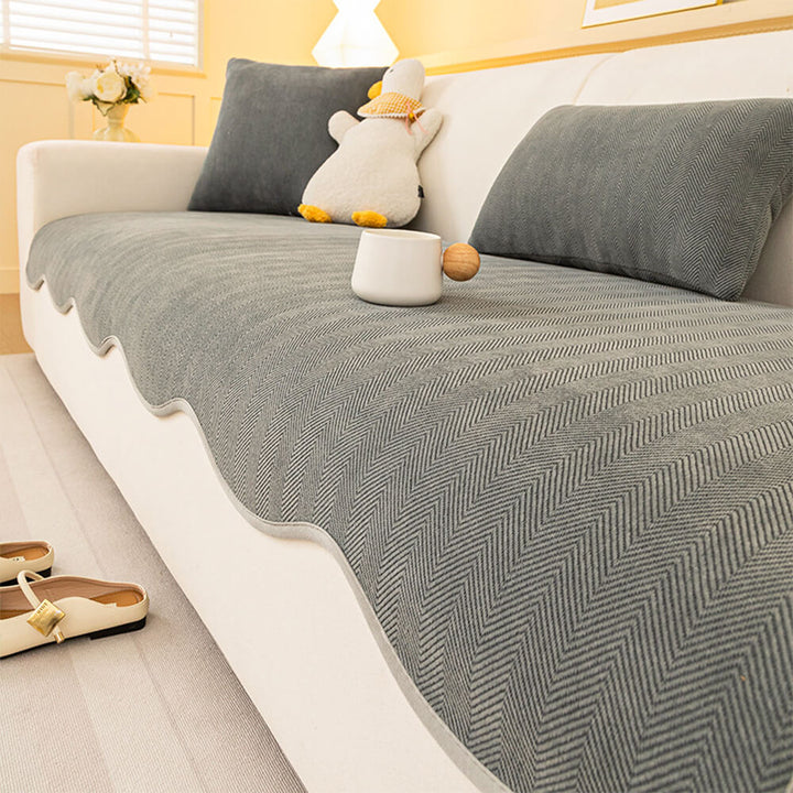 Stylish and functional herringbone chenille sofa protector, designed for comfort and pet-friendly homes.