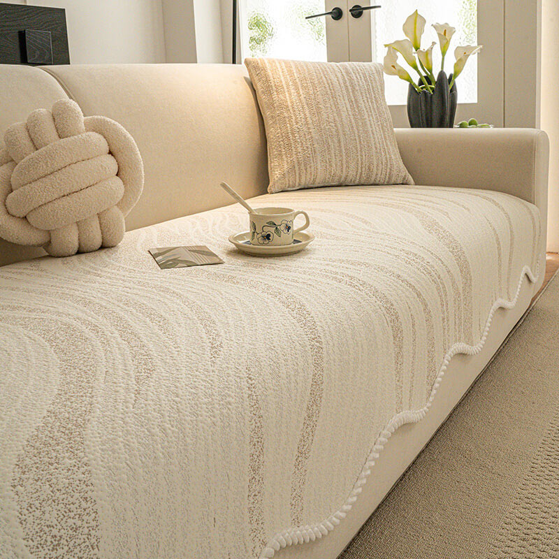 Top-down view of a modern sofa with a minimalist ice silk couch cover, clean design, pet friendly
