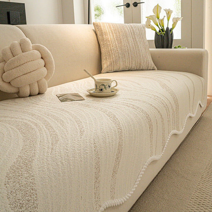 Top-down view of a modern sofa with a minimalist ice silk couch cover, clean design, pet friendly