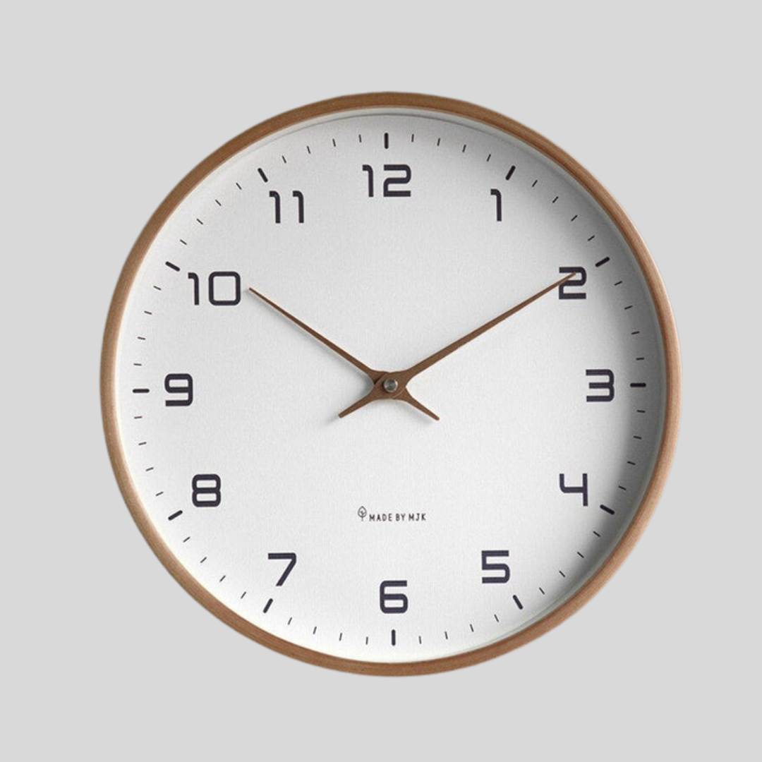 Minimalist Scandinavian wooden wall clock with silent movement, perfect for modern home decor in living room or office.