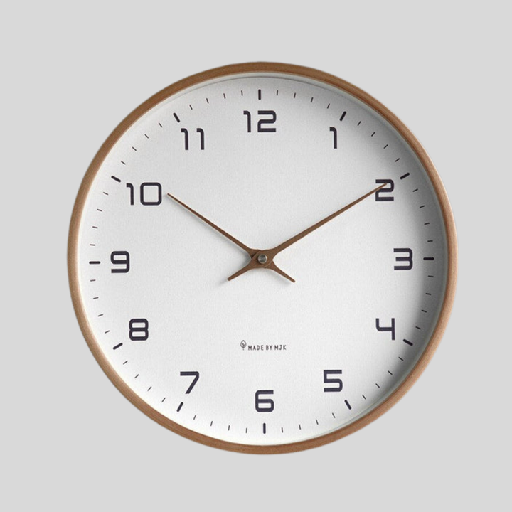 Minimalist Scandinavian wooden wall clock with silent movement, perfect for modern home decor in living room or office.