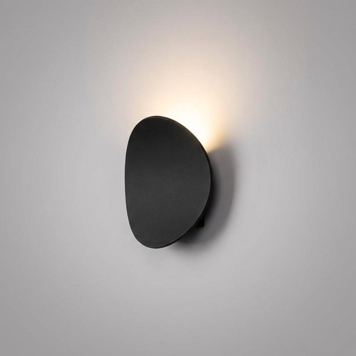 Sleek aluminum LED uplight wall sconce, minimalist design, modern and energy-efficient ambient lighting fixture.