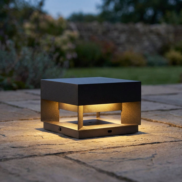 Minimalist square outdoor LED wall light for modern homes. Weatherproof & energy efficient exterior lighting.