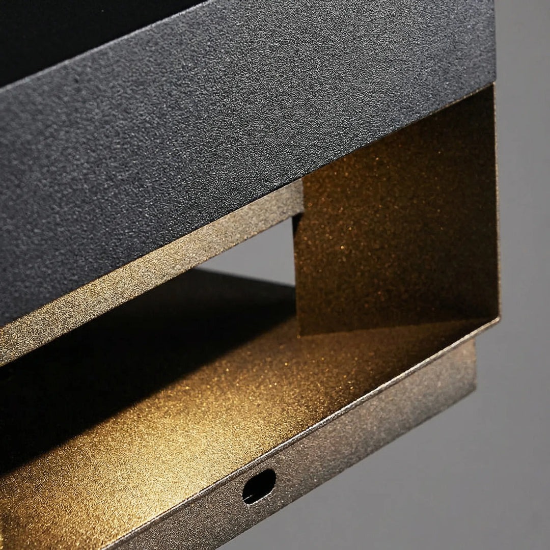Energy-efficient LED outdoor light, a weatherproof square wall lamp with a modern minimalist design.