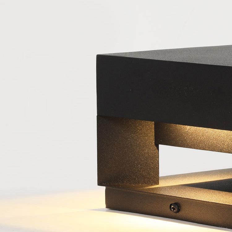 Modern minimalist square exterior wall light, LumaBloc, offering stylish and energy-efficient garden lighting.