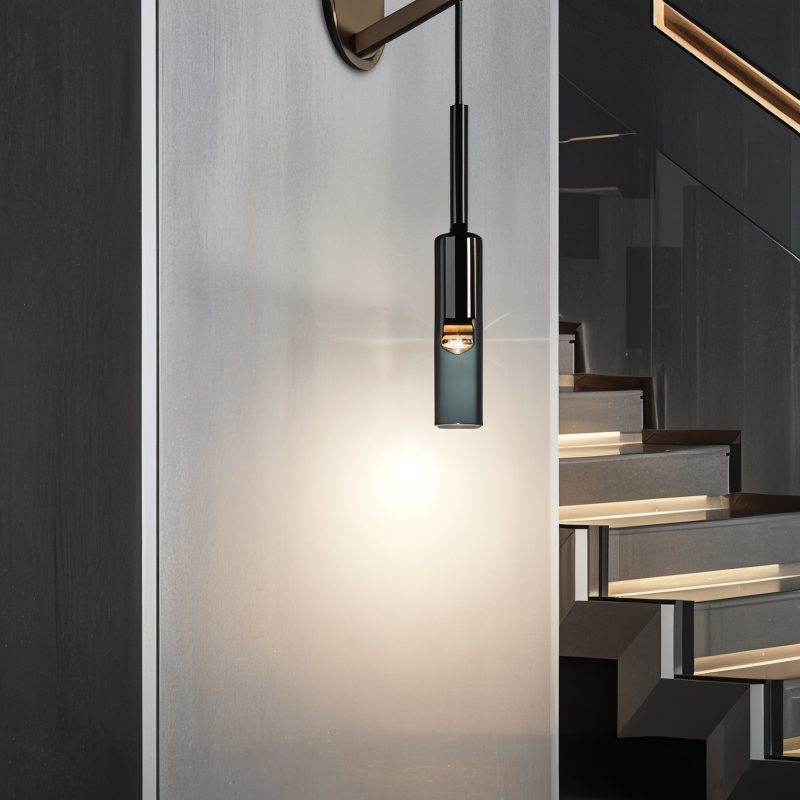 Minimalist wall lamp with elegant smoke glass shade, perfect for modern home decor and ambient lighting.