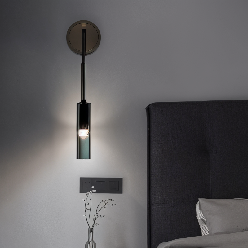 Decorative metal wall lamp with a chic smoke glass globe, adding a modern touch to any room.