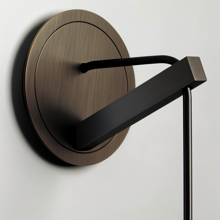 Elegant wall lamp showcasing unique smoke glass shade and polished copper base for stylish homes.