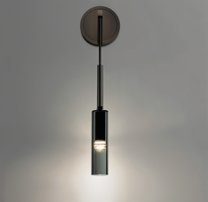 Stylish minimalist LED wall lamp, smoke glass globe, and copper base for contemporary home decor.