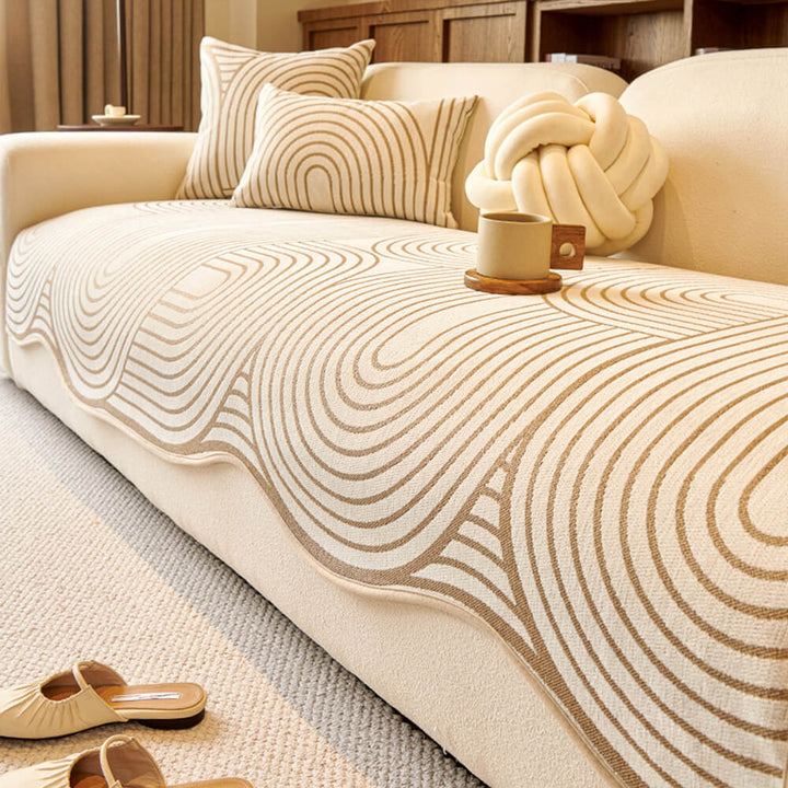 Modern abstract chenille sofa protector in irregular shape, protecting furniture from pets and spills.