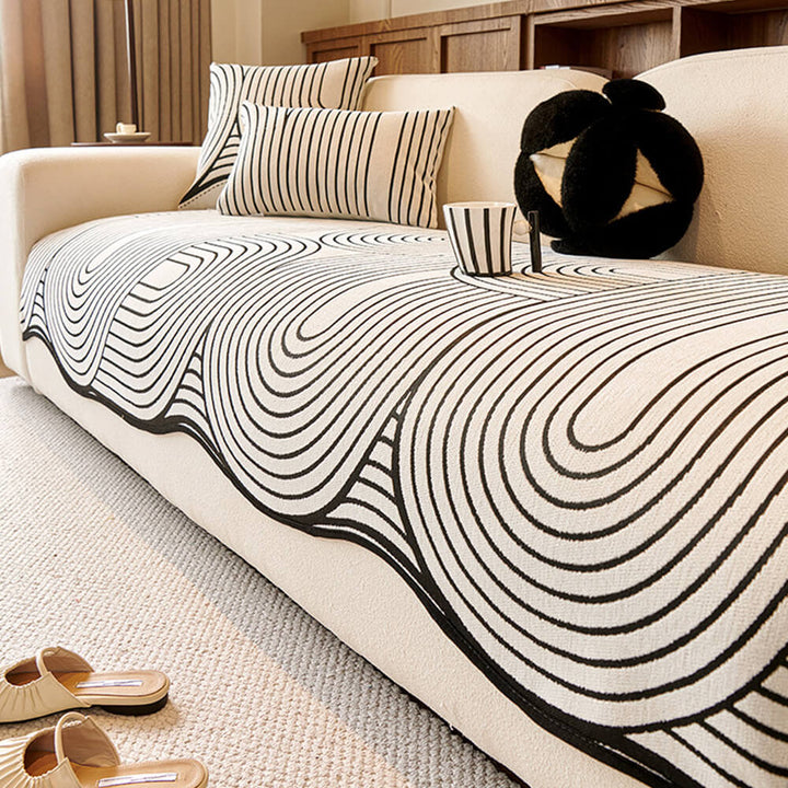 Close-up of a modern abstract chenille couch cover, highlighting its soft texture and unique design.