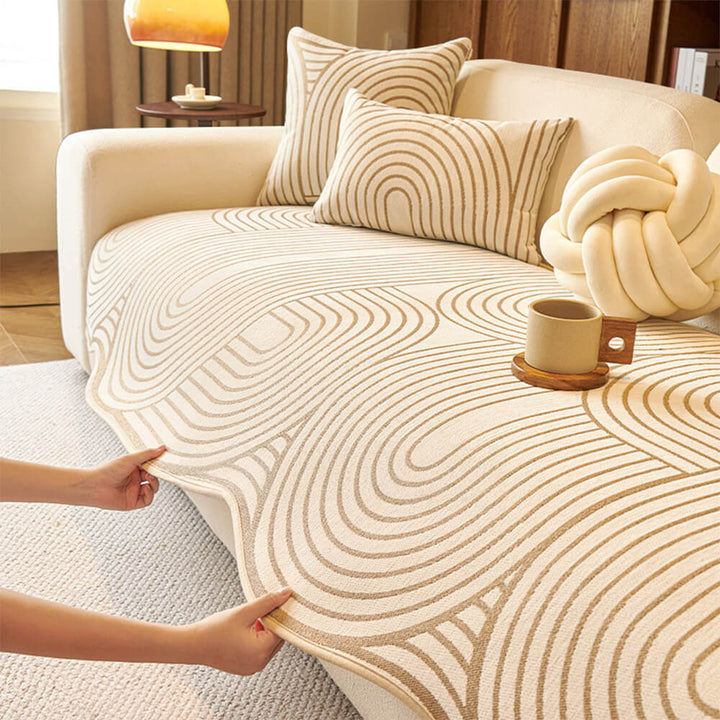 Machine washable chenille sofa protector featuring a contemporary abstract irregular pattern.