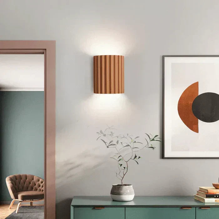 Decorative resin wall lamp with energy-efficient LED, ideal for modern home lighting.