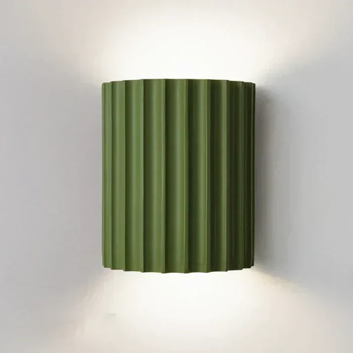 Sleek contemporary resin wall lamp, an artistic LED lighting fixture for modern homes.