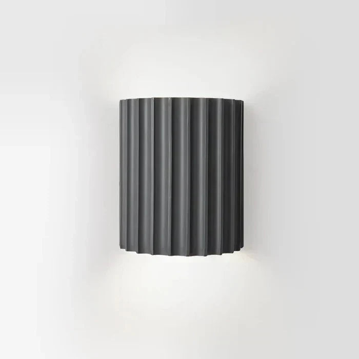 Modern aesthetic wall lamp, an LED resin wall sconce for contemporary home decor lighting.