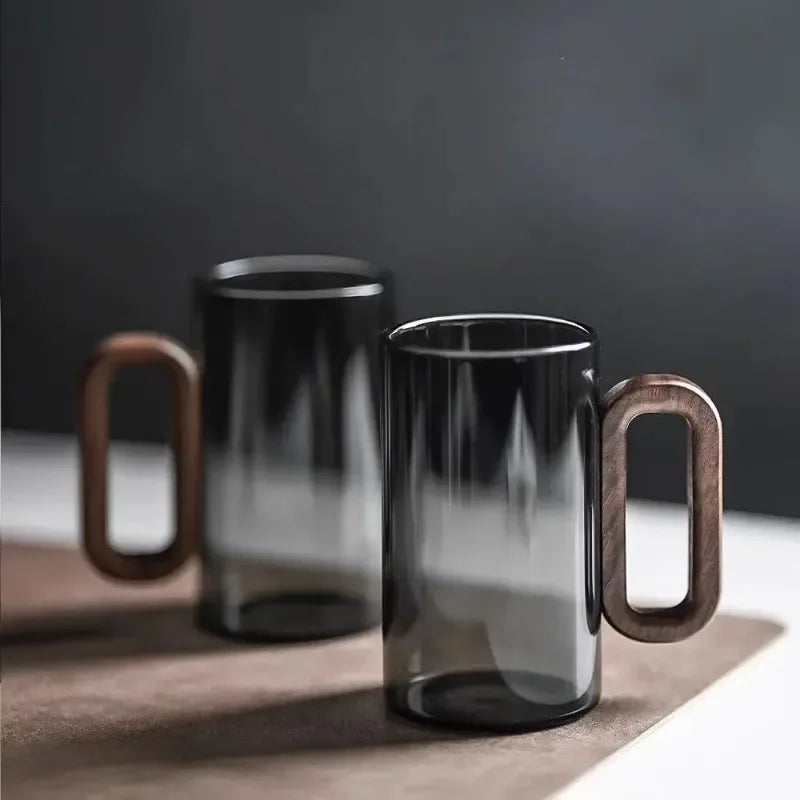 Modern black fog borosilicate glass tumblers with unique texture, perfect for home decor & beverages.
