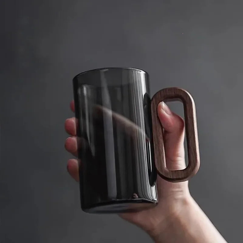 Elegant black glass drinkware set for modern kitchens or dining, ideal for unique home beverage serving.