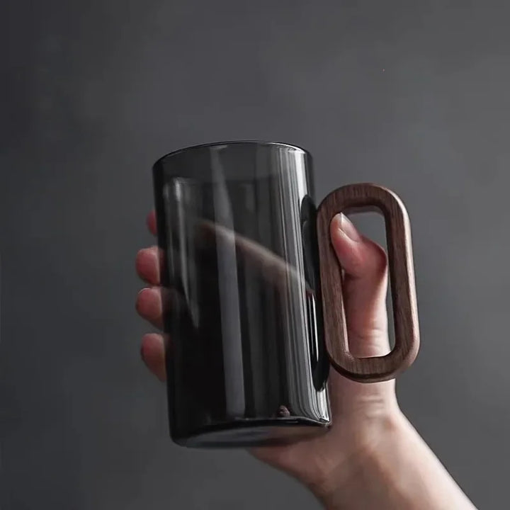 Elegant black glass drinkware set for modern kitchens or dining, ideal for unique home beverage serving.