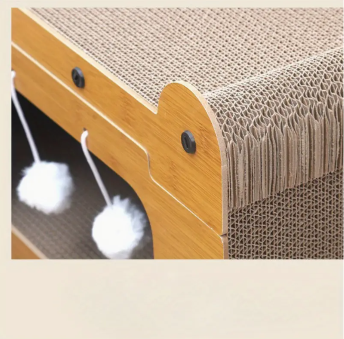 Contemporary cat house with scratching surface, plush sleeping area, and engaging cat toy