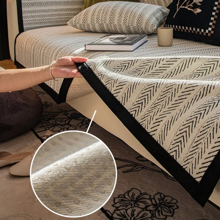 Stylish chenille sectional cover in a living room setting, ensuring complete furniture protection.