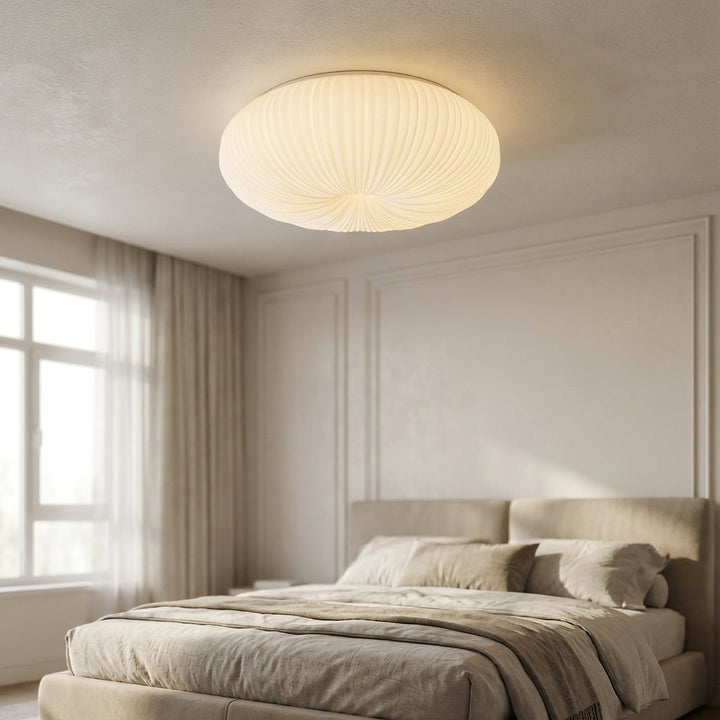 Modern Ciravine flush mount LED ceiling light with sculpted design, offering an elegant ambient glow.