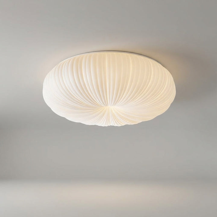 Sleek, energy-efficient LED flush mount light, a modern ceiling fixture enhancing home decor with soft ambient lighting.