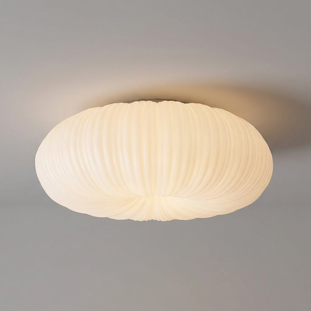 Ciravine modern flush mount LED ceiling light, sculpted design, provides dimmable, energy-efficient ambient lighting.