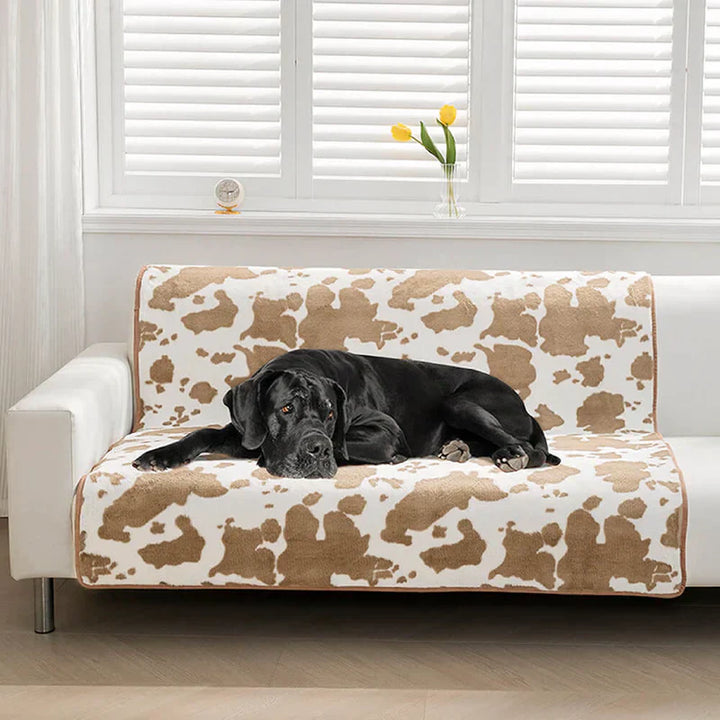 Soft cow print pet blanket for furniture protection, stylish and comfortable dog or cat bed accessory