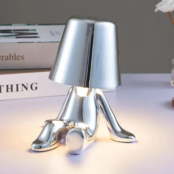 Modern accent lamp, cordless and portable, casts a beautiful ambient glow.