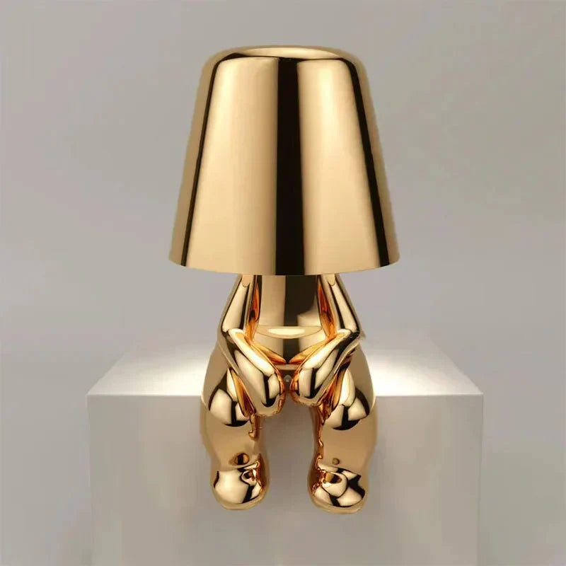 Elegant decorative table lamp, rechargeable and cordless, enhances living room ambiance.