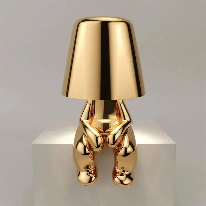 Elegant decorative table lamp, rechargeable and cordless, enhances living room ambiance.
