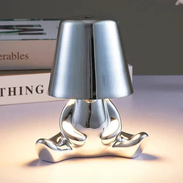 Decorative table lamp with warm ambient lighting, ideal for creating a cozy atmosphere.
