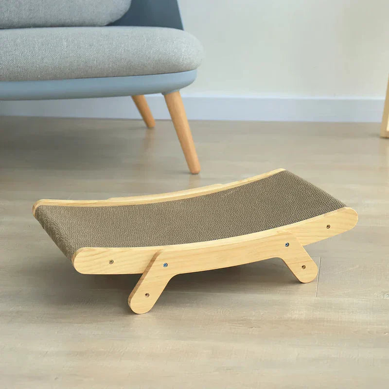 Cat happily lounging on a new modern cat scratcher bed, a perfect piece of pet furniture