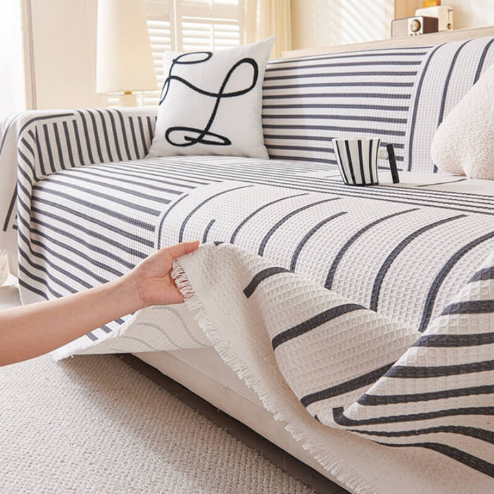 Vibrant multi-color geometric sofa slipcover, perfect for a modern living room setting